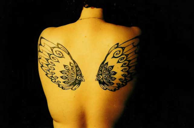 my wings took about 5 hours each to do, and after the retouch later there was probably more than 16 hours worth of work all together. someday i'll fly away.