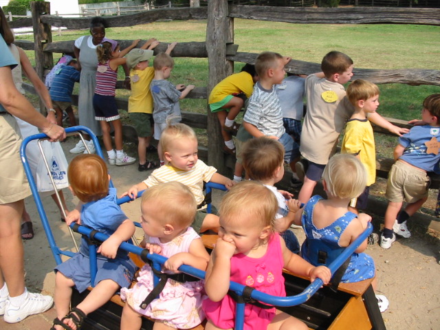 Toddler 1 in the buggy in Colonial Williamsburg