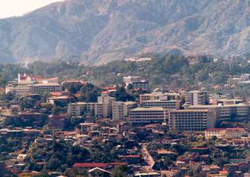 Education is very, very important to the Filipino family.  Dorm is front - left center of white buildings,