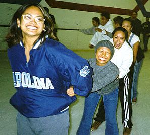 Menche is very atheletic and helpful too.  She taught a skating class.  Who wouldn't follow such a friendly smile.
