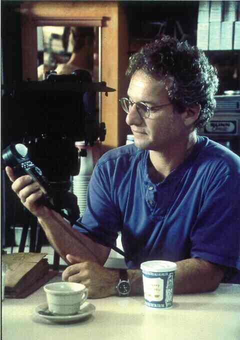 Dick Fisher takes a light meter reading on-set