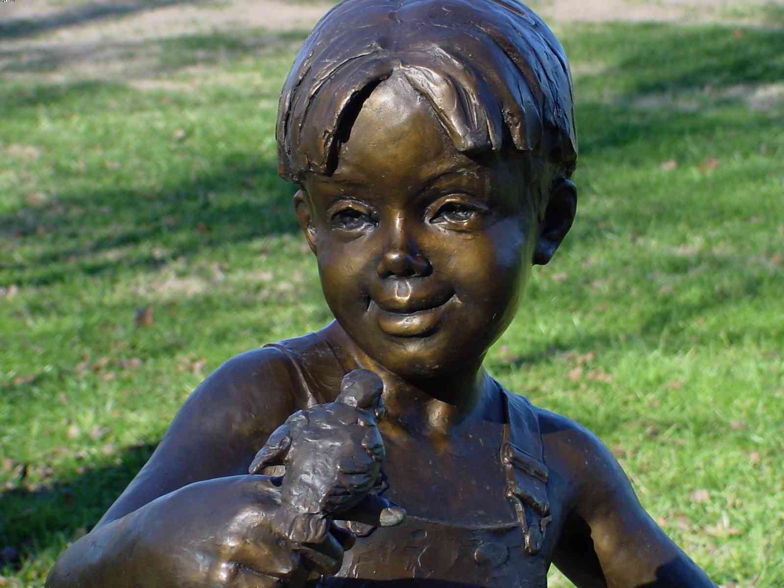 Boy with Bird, photograph by Bobby Morgan.  Click for a larger view.