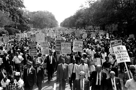 Marchers walk along Constitution Avenue as they make their way from the Washington Monument to the Lincoln Memorial, August 28, 1963. Photo courtesy US State Department.