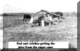 dad&addySorghummaking.gif (329500 bytes)