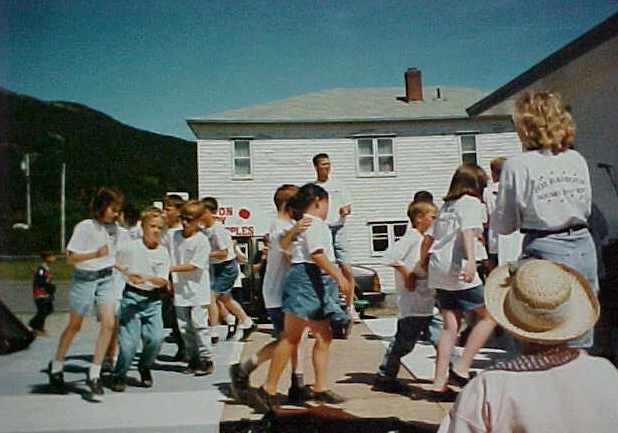 Children square dancing at the Folk Festival 