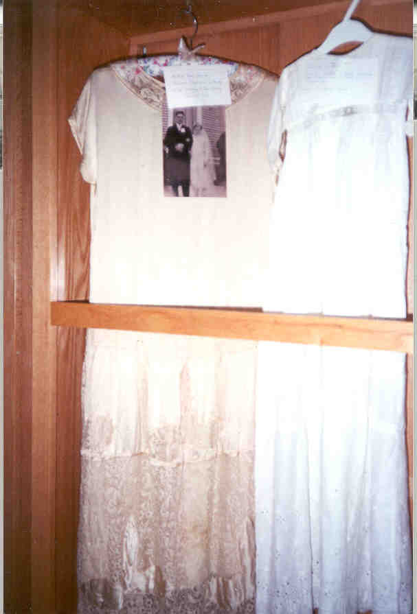 Wedding dress of Marianne Healey and Baptismal Gown of Michael T. Duke