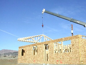Trusses laid up on top via crane