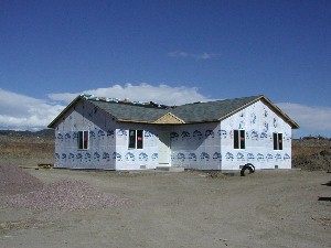 Shingles on, Windows in, House wrapped