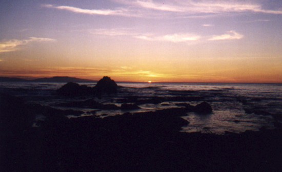 An outline of the rocks in the sinking sun