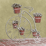 $19.95...Big Wheel Planter...25 1/2"wide-20 1/2"high...#34269