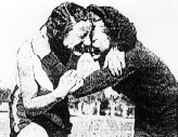 1940 Nationals - Thelma Peake congratulates Decima Norman after Decima's record hurdles run