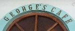 Over the door of George's cafe-    