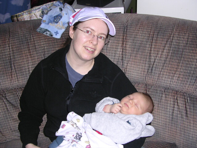 Gigi holding her new nephew