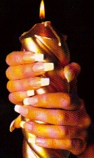Sheryl holding a candle, notice her lovely nails