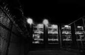 Night view of the H-wing cell block. (©Ken Light)