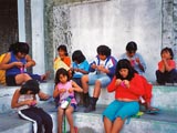 Girls sewing bags for Christmas. Top row, left to right: Reyna, Alina, Karina, Sonia, Daniela. Bottom row: Lucero, Arminda, Eva.