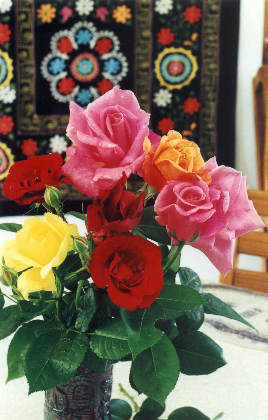 An Arrangement of Red Yellow and Pink Roses