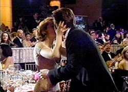 Gillian kissing David