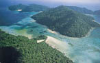 Aerial view of the superb Surin Islands. The yellow arrow indicates the location of the main camp.