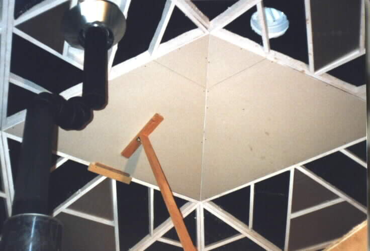 hanging sheetrock using brace board and guides