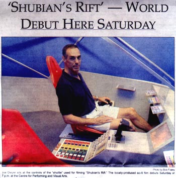 Director Dwyer in the cockpit of the DragonPhoenix