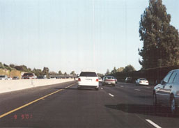 this is on the 880 on the way to Shoreline. its hard to tell in this small picture but the minivan has a spoiler on it