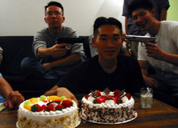 drinks and cake at eric's afterwards.. erg, bb guns.. i got shot in the butt with a bb gun that nite! >:o