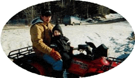 Chris & Tyrus on the Four Wheeler