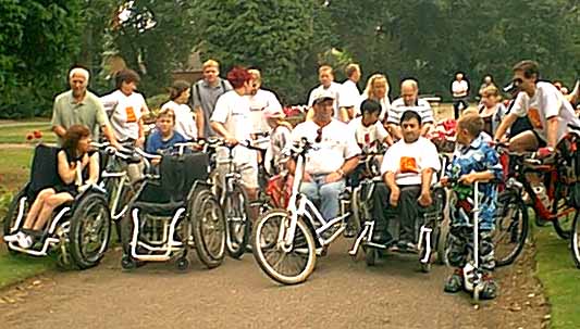 Wheelchair users and cyclists at a special Leonard Cheshire event