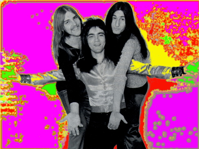 Early promo photo with Alex, John, and Geddy