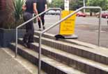 Folks using the dangerous steps.  They are quite safe when dry.

Click this picture to see a larger photo.