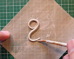 Rolling a coil.