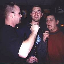 My friends Ryan Wonderly, Dominique Burwell, and I singing at the Boondocks Bar & Grill in Britton, MI - November 2001