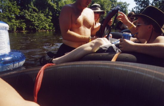 Ken is either looking for something in a sack or he is giving Kurt a thorough examination.