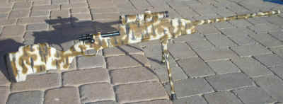 For the final coat the author painted tiger stripes that are designed to help the rifle blend into the Arizona scrub brush.  