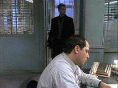 Nick's partner's desk is just outside Captain Reese's office