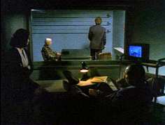 observing a suspect through the one-way mirror