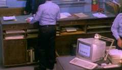 the pigeonholes at the back of the information desk