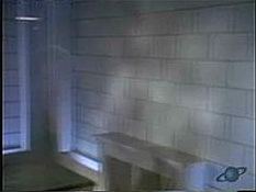 the far wall of the interrogation room