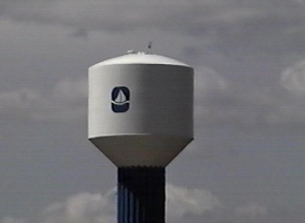 water tower on Highway 20, west of this intersection