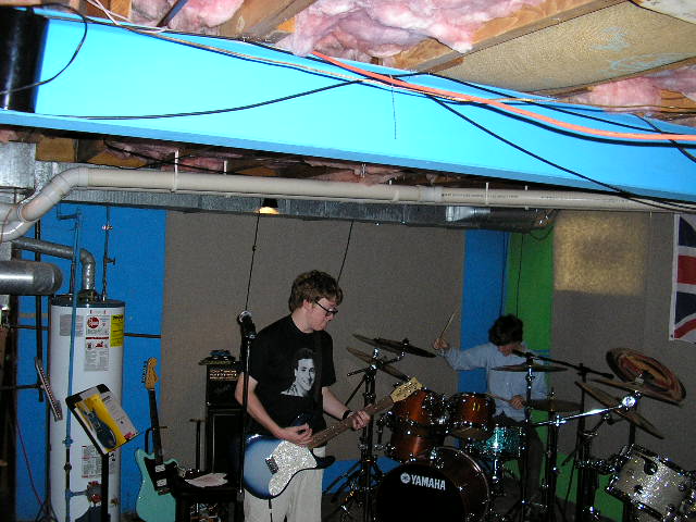 Opposite positions...Hickey on the drums and Tom on the guitar. 