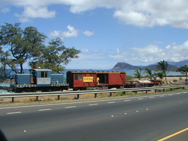 The work train between Farrington Highway and the deep blue sea
