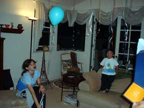 Jody and Jason playing with balloons.