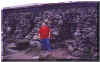 Mark in front of the oldest building on Mt. Washington