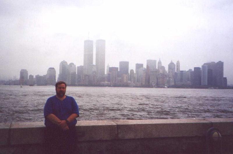 Mark and the NYC skyline from Ellis Island
