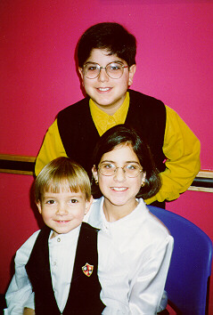 Guy-Michael, Jennifer & Christopher in their holiday duds