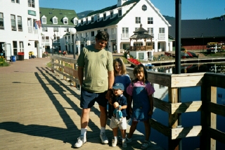 Paul and kids at the bridge by Town Square