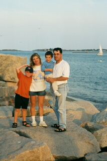 Paysh, Dave, and family posing on their final night