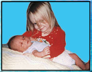 [Ellen holding Calvin]