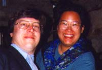[Tom and Tracy at a wedding]